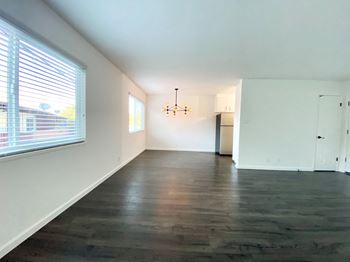 Spacious Living Room with Large Windows and Hardwood Flooring at 2120 Valerga in Belmont, CA 